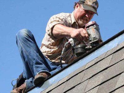 A man repairing the roof